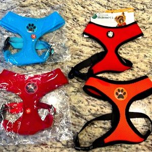NEW ADORABLE dog harnesses. Will thrown in 2 used ones also (green and tan).